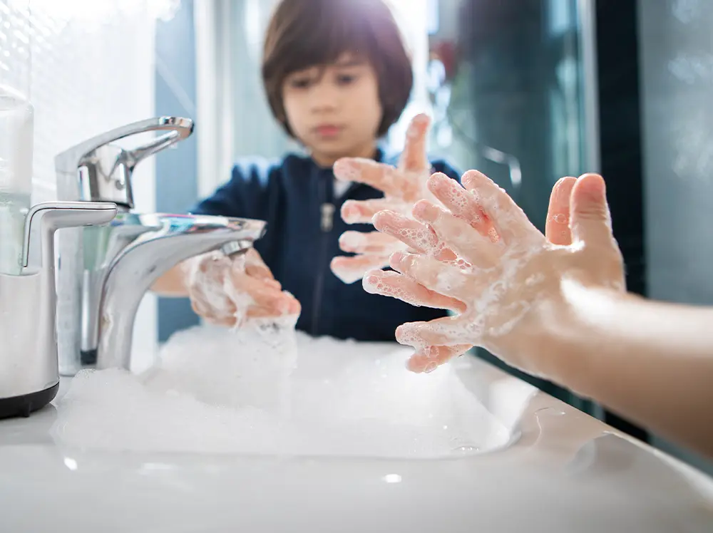 Children washing their hands